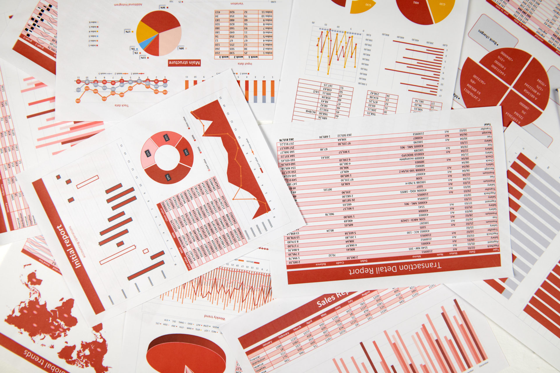 Flat top view of business workspace - reports with data, tables and analytic chart. Business financial accounting concept.